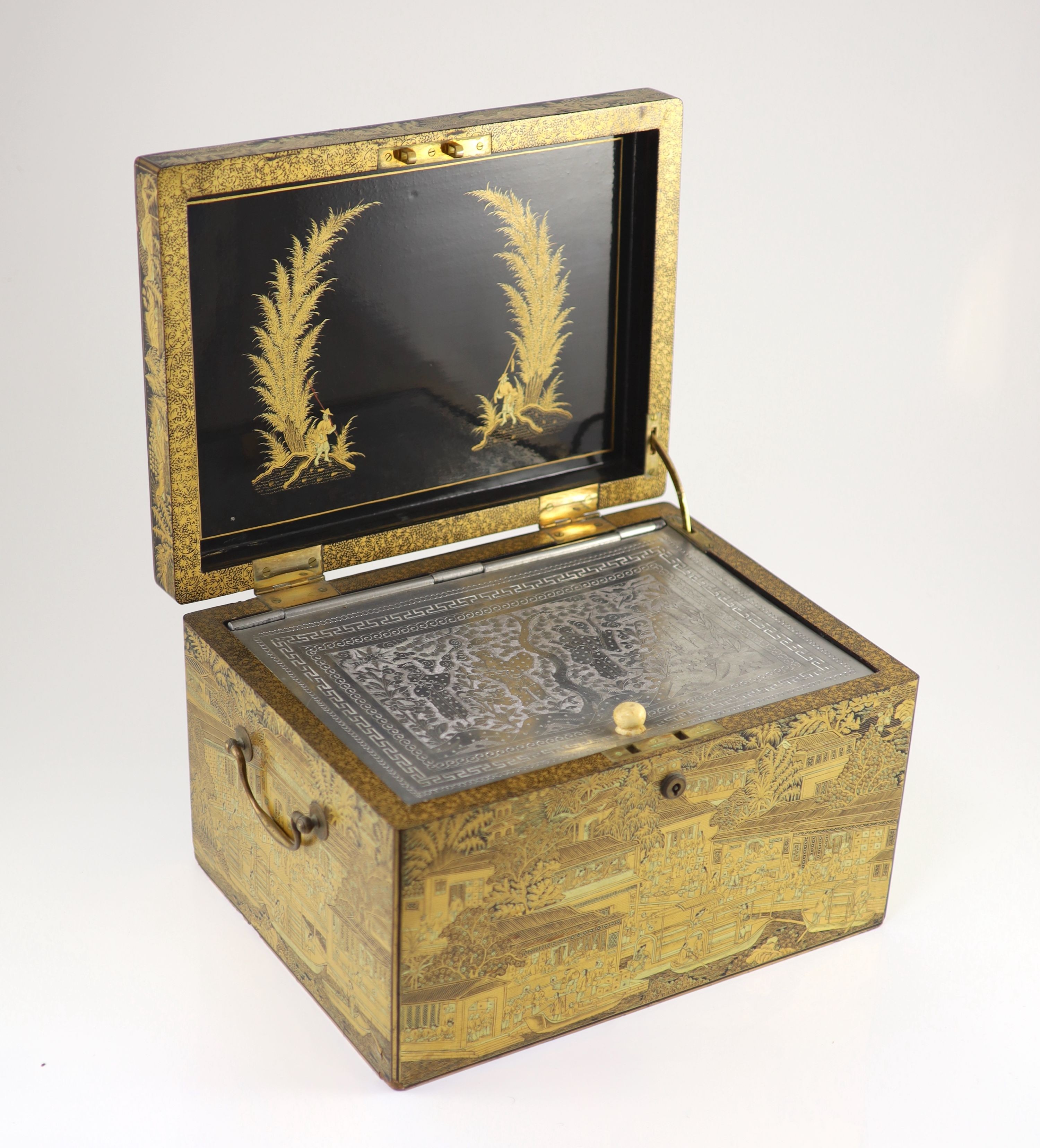 A Chinese export gilt decorated black lacquer tea chest, early 19th century, 35 cm wide, including side carrying handles